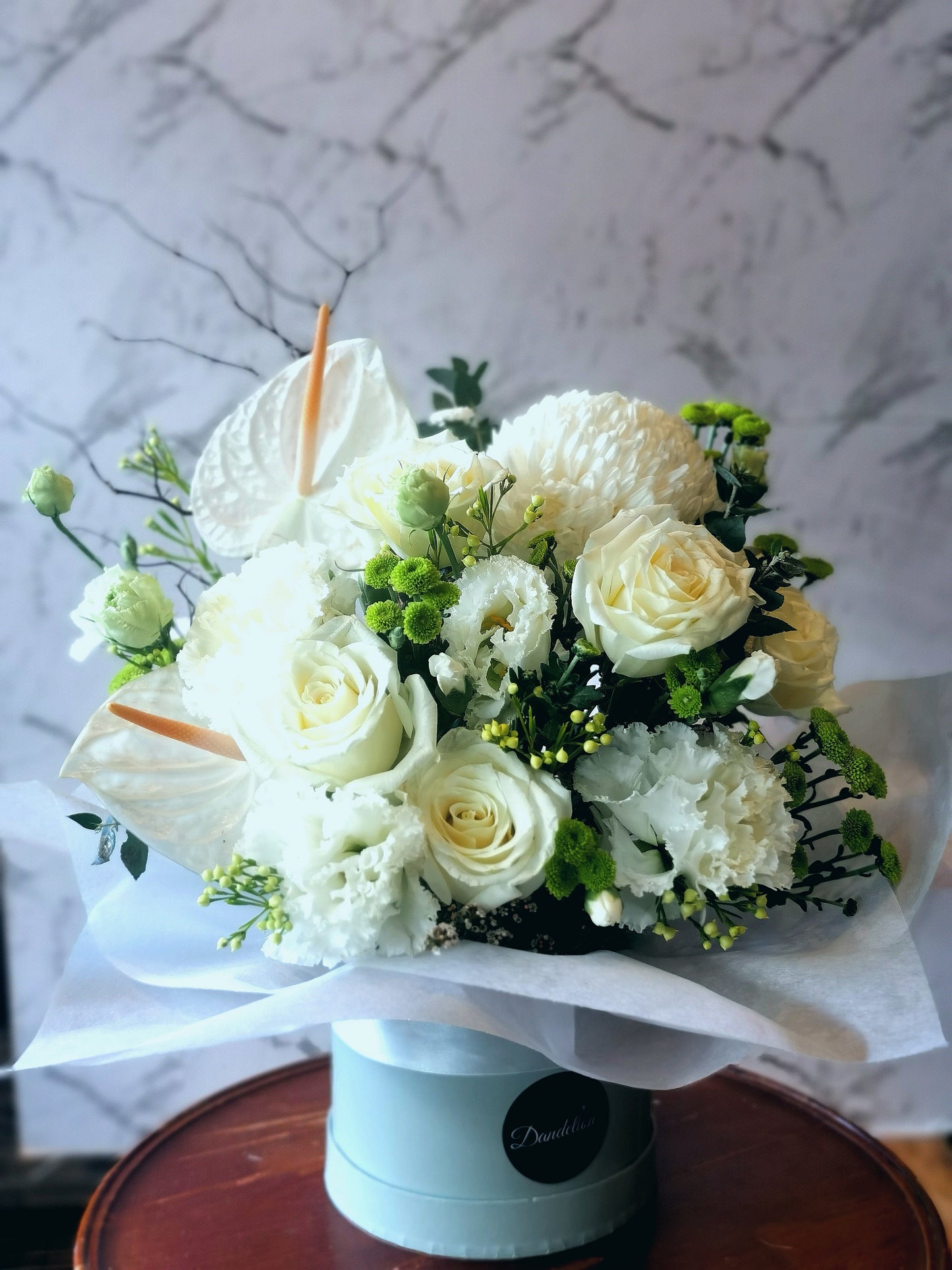 Blooms in Flat Hat Box Arrangement