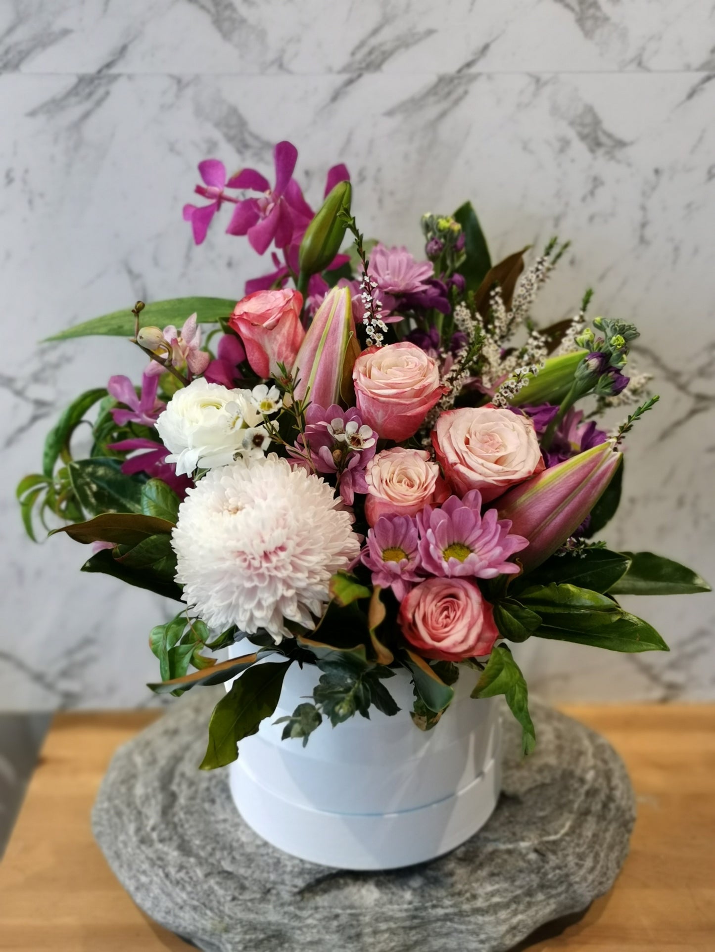 Pastel hat box arrangement