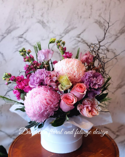Blooms in Flat Hat Box Arrangement