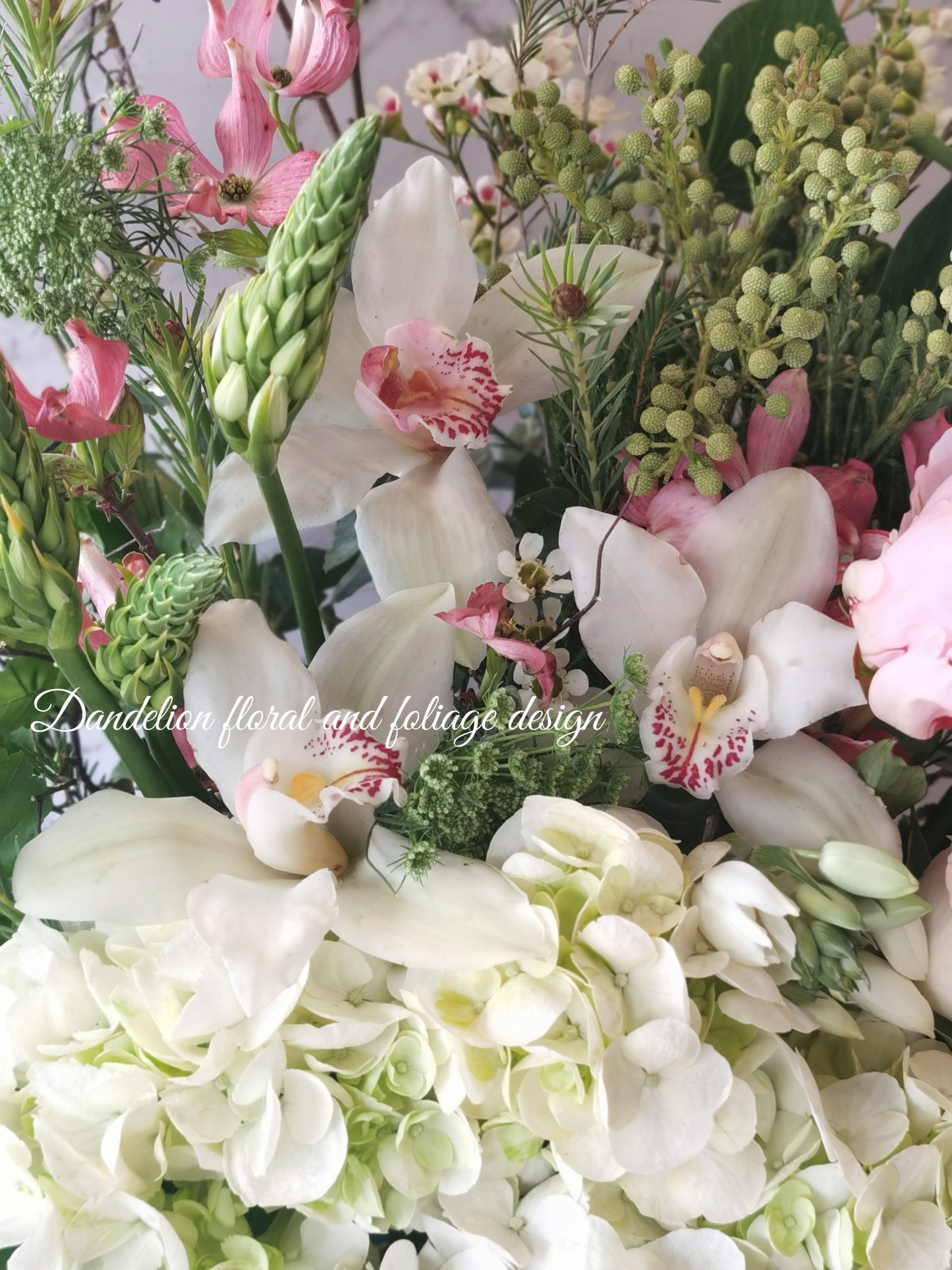 A beautiful assortment of Hydrangea, peony, Dogwood, Pink roses, Canterbury bell and etc. A great gift for her, anniversary, birthdays and etc.