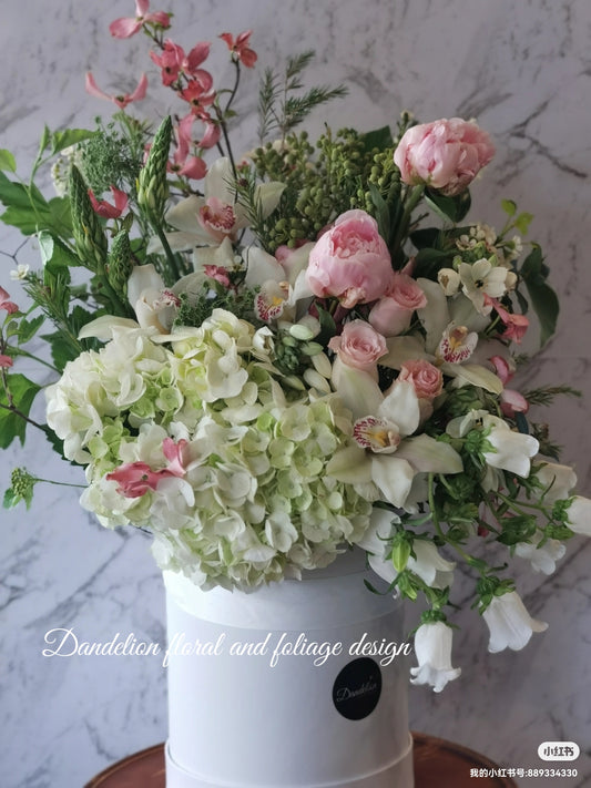 A beautiful assortment of Hydrangea, peony, Dogwood, Pink roses, Canterbury bell and etc. A great gift for her, anniversary, birthdays and etc.