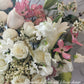 This mega tall flower hat box is perfect gift to express loads of big love!! This stylish mega arrangement is a perfect way to show off an array of stunning soft pink, white and green fresh blooms.