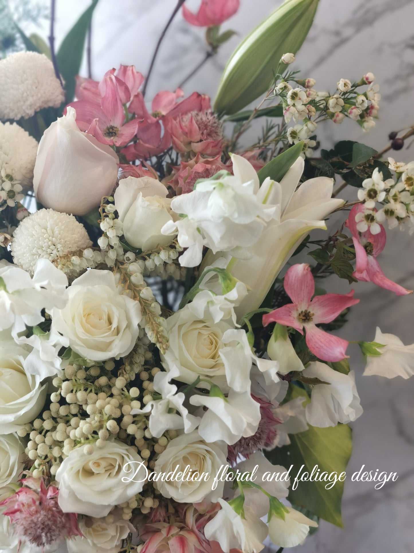 This mega tall flower hat box is perfect gift to express loads of big love!! This stylish mega arrangement is a perfect way to show off an array of stunning soft pink, white and green fresh blooms.