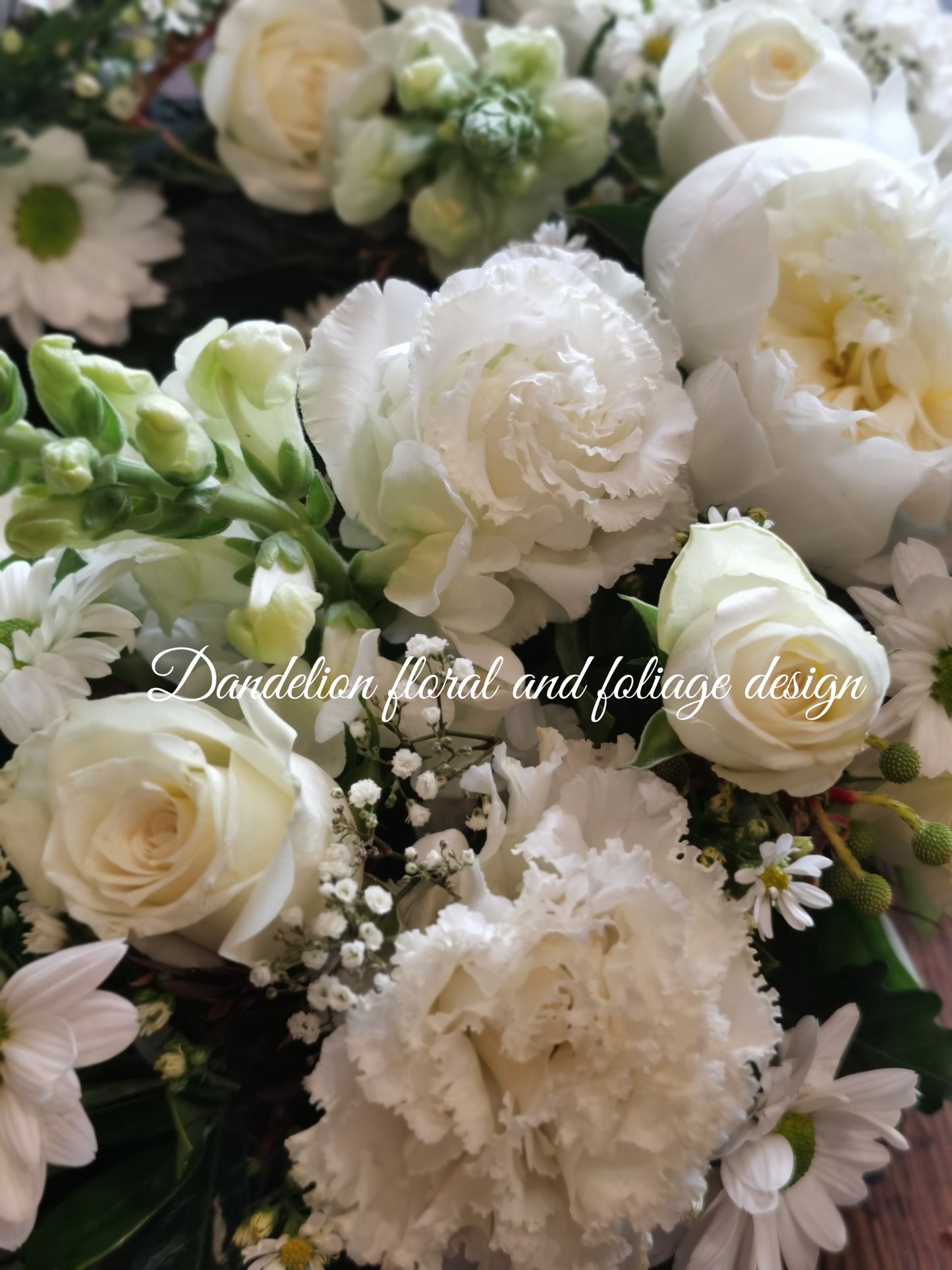 This Sympathy Wreath is made from a selection of fresh seasonal flowers arranged with green foliage, handmade by our skilful florists.
Standard: 50 cm in diameters; 
Large: 60cm in diameters; 
X-large: 70cm in diameters;
Please note: There is 2 business day lead time on all wreaths.