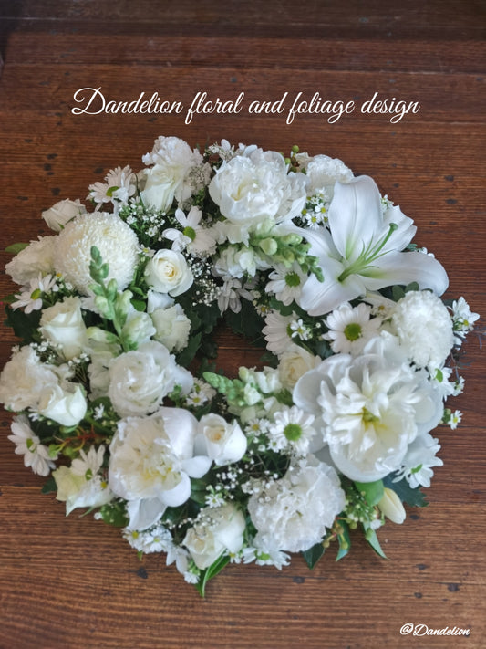 This Sympathy Wreath is made from a selection of fresh seasonal flowers arranged with green foliage, handmade by our skilful florists.
Standard: 50 cm in diameters; 
Large: 60cm in diameters; 
X-large: 70cm in diameters;
Please note: There is 2 business day lead time on all wreaths.
