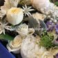 This blue bloom bouquet uses cool tones with seasonal flowers and complimenting greenery. This is a perfect gift to celebrate occasions for baby boy, graduation, birthday, anniversary and more.