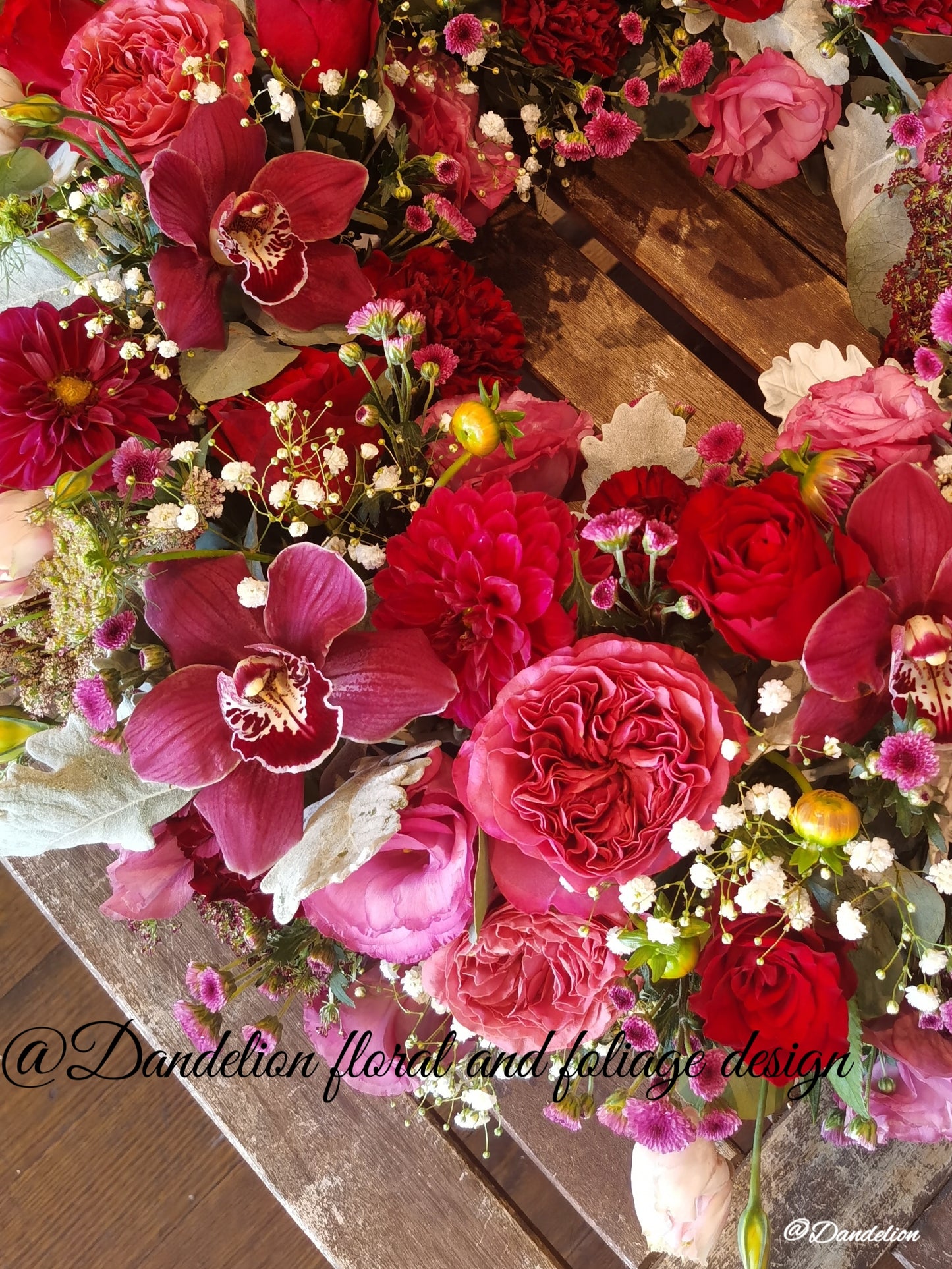 This Sympathy Wreath is made from a selection of fresh seasonal flowers arranged with red/pink flowers, foliage, handmade by our skilful florists.
Standard: 50 cm in diameters; 
Large: 60cm in diameters; 
X-large: 70cm in diameters;
Please note: There is 2 business day lead time on all wreaths.
