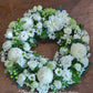 This Sympathy Wreath is made from a selection of fresh seasonal flowers arranged with green foliage, handmade by our skilful florists.
Standard: 50 cm in diameters; 
Large: 60cm in diameters; 
X-large: 70cm in diameters;
Please note: There is 2 business day lead time on all wreaths.