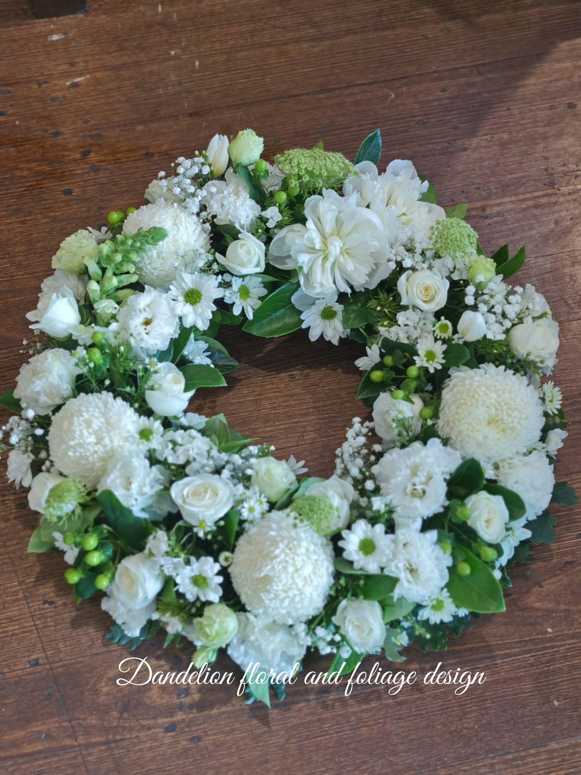 This Sympathy Wreath is made from a selection of fresh seasonal flowers arranged with green foliage, handmade by our skilful florists.
Standard: 50 cm in diameters; 
Large: 60cm in diameters; 
X-large: 70cm in diameters;
Please note: There is 2 business day lead time on all wreaths.
