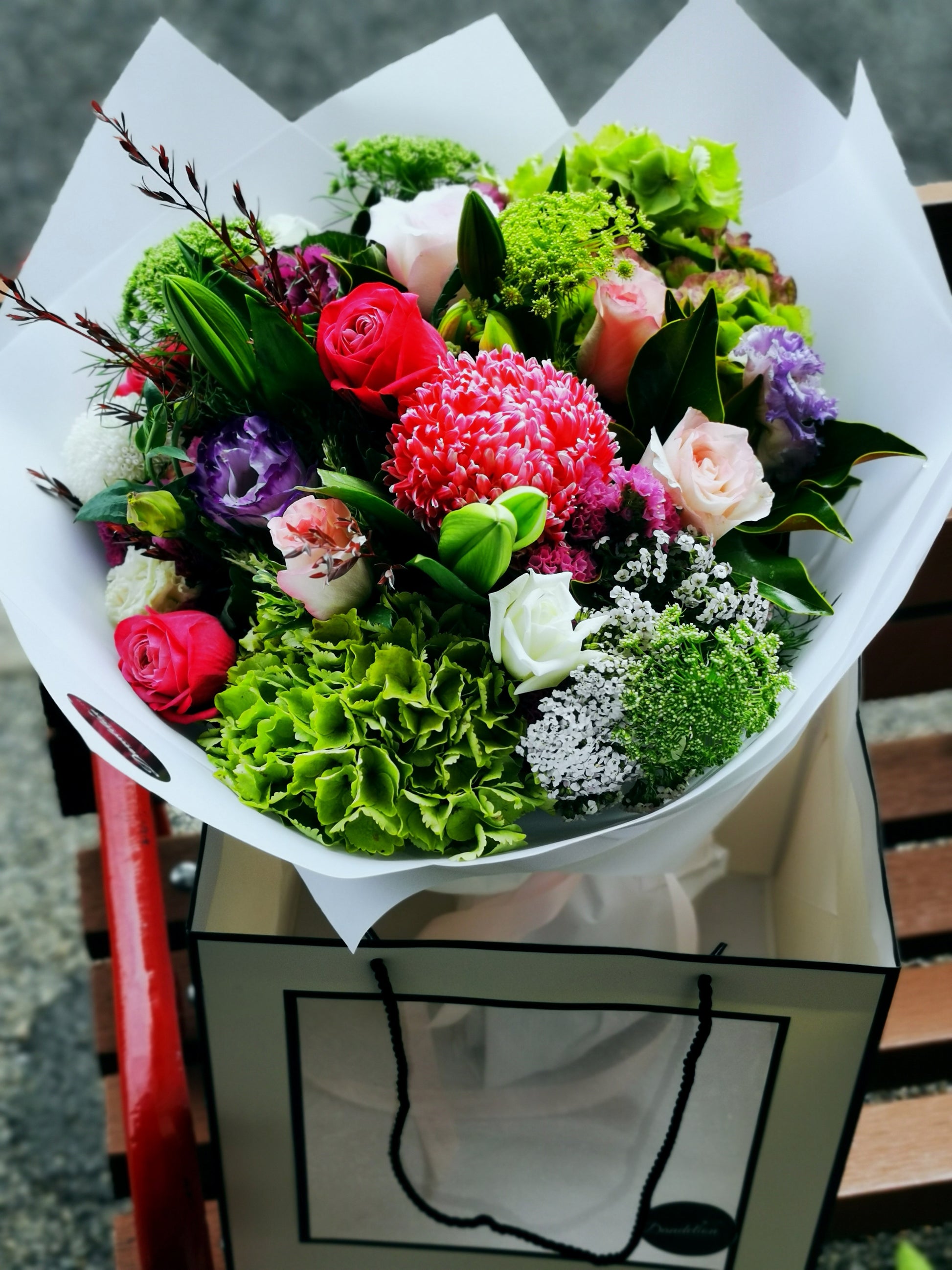 Bouquet of flowers with greenery and colorful flowers