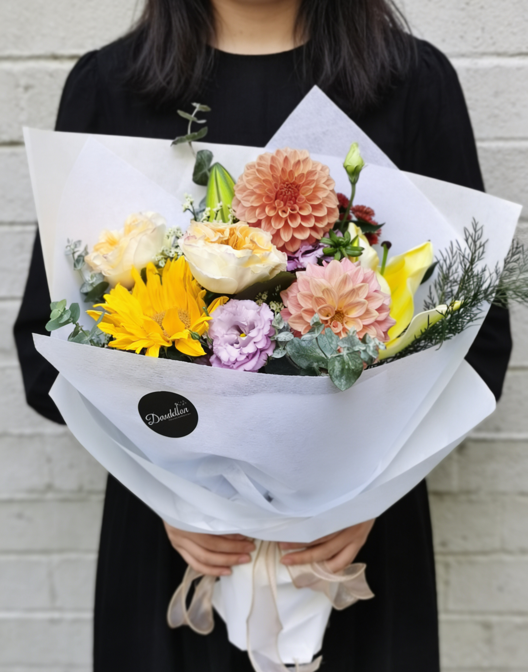 cozy, autumnal blend of sun-kissed sunflowers, velvety dahlias, and soft lavender accents