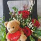 6 gorgeous premium red roses in a cute carry box with red ribbon and a cute teddy bear.. Approximately 250mm high. A perfect way to say “I love you”. 